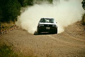 Mark Utecht / Brenda Corneliusen VW GTI limps to the finish of SS6 on three wheels.