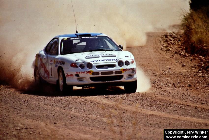 Paul Choinere / Jeff Becker Hyundai Tiburon at speed near the finish of SS6.