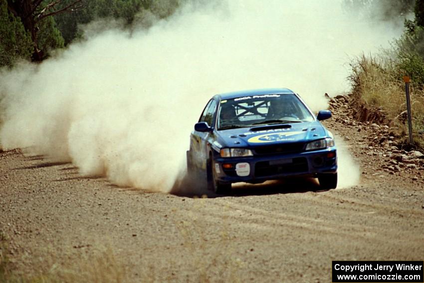 Eric Eaton / Kenny Almquist Subaru Impreza at speed on SS6.