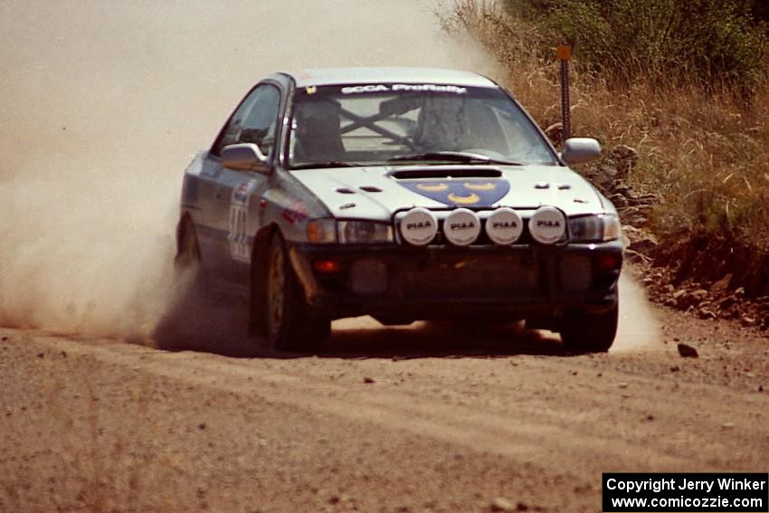 Jonathan Ryther / Janice Damitio Subaru Impreza 2.5RS at speed near the finish of SS6.