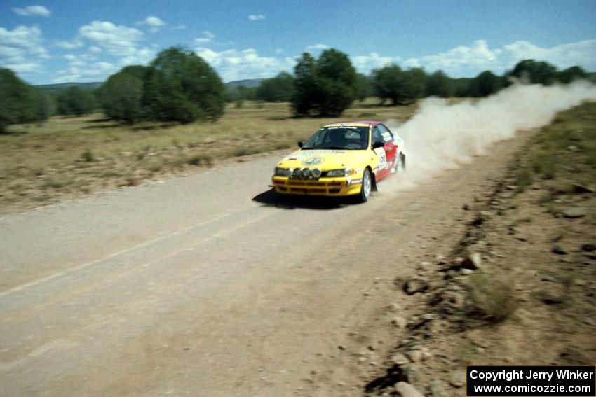 Janusz Jastrzebski / Tomasz Zaremba Subaru Impreza at speed near the finish of SS6.