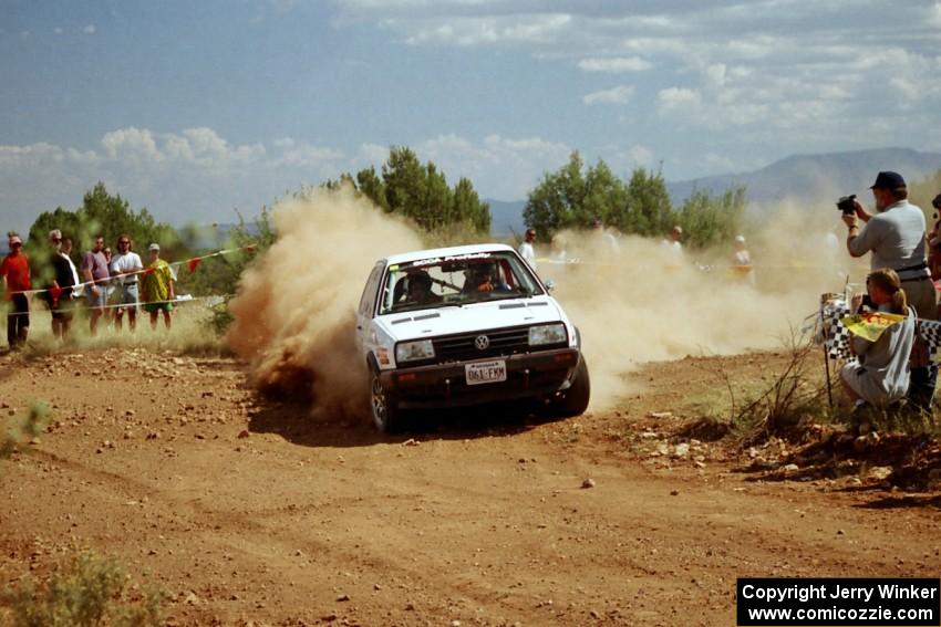 Mark Utecht / Brenda Corneliusen VW GTI through the spectator point on SS7.