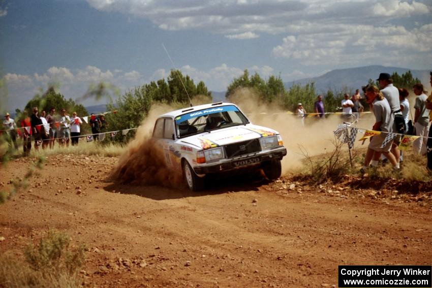 Bill Malik / Amity Trowbridge Volvo 240 through the spectator point on SS7.