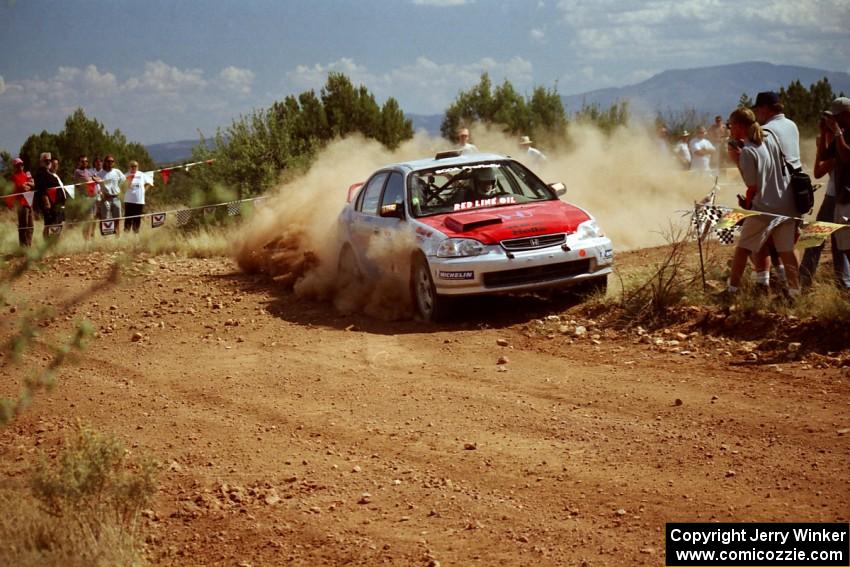 Nick Robinson / Carl Lindquist Honda Civic through the spectator point on SS7.