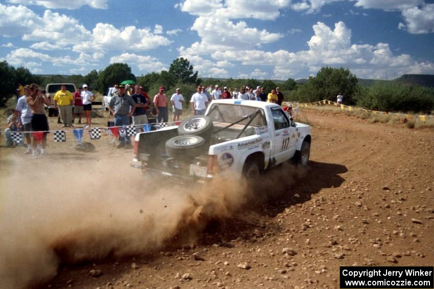 Ken Stewart / Doc Schrader Chevy S-10 through the spectator point on SS7.