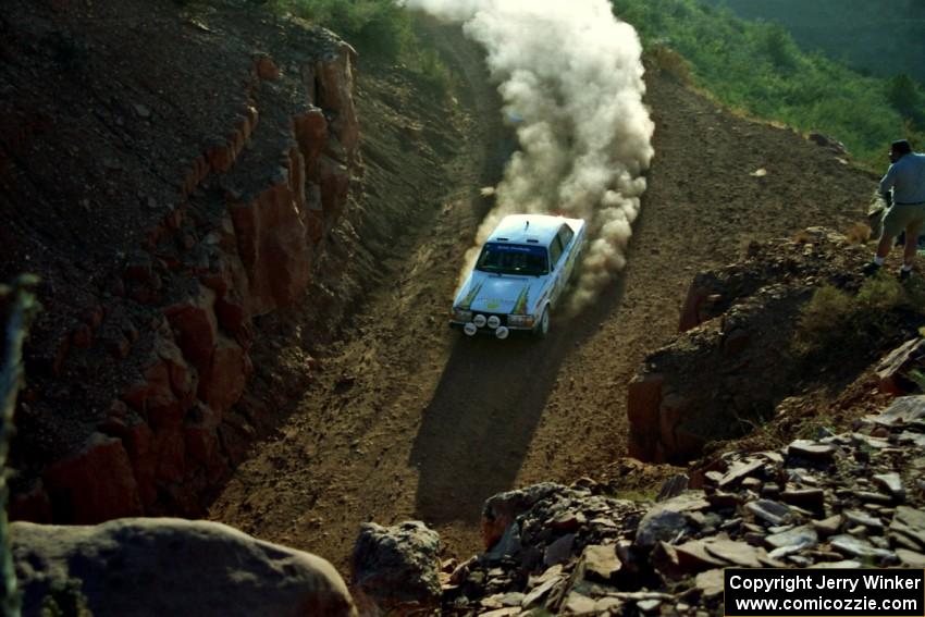 Bill Malik / Amity Trowbridge Volvo 240 heads through 'the cut' on the First View II stage.