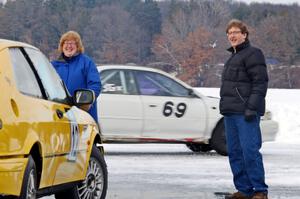 Julie Kochevar and John Kochevar in front of the Tony Burhans / Dan Burhans II SAAB 9-3