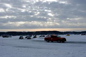 The field goes out for a pace lap prior to the start of a sprint race.