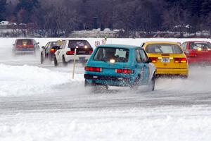 Tony Burhans / Dan Burhans II SAAB 9-3 and Brad Johnson / Morgan Johnson VW Rabbit follow the rest of the field