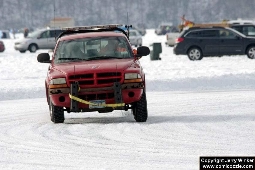 Jim Anderson's Dodge Pickup working as sweep for the first lap