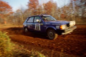 Mark Utecht / Brenda Corneliusen Dodge Omni GLH Turbo at speed on the practice stage.