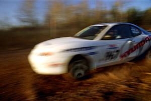 Perry King / Mark Williams Hyundai Tiburon at speed on the practice stage.