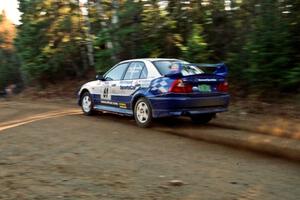 Karl Scheible / Russ Hughes Mitsubishi Lancer Evo V at speed near the finish of SS1, Herman.