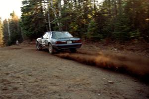 Mike Hurst / Rob Bohn Ford Mustang at speed near the finish of SS1, Herman.