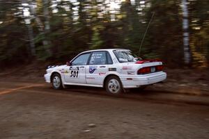 Todd Jarvey / Rich Faber Mitsubishi Galant VR-4 at speed near the finish of SS1, Herman.