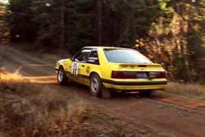 Don Rathgeber / Jimmy Brandt Ford Mustang LX at speed near the finish of SS1, Herman.