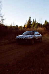 Jonathan Ryther / Janice Damitio Subaru Impreza 2.5RS at speed near the finish of SS1, Herman.