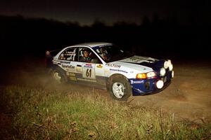 Karl Scheible / Russ Hughes Mitsubishi Lancer Evo V at the spectator corner on SS4, Far Point I.