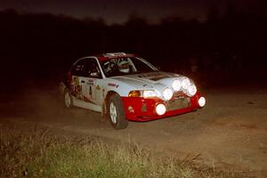 Garen Shrader / Michael Fennell Mitsubishi Lancer Evo IV at the spectator corner on SS4, Far Point I.