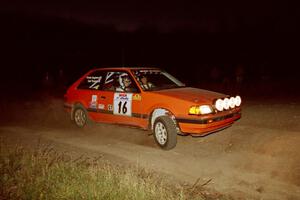 Gail Truess / Pattie Hughes Mazda 323GTX at the spectator corner on SS4, Far Point I.