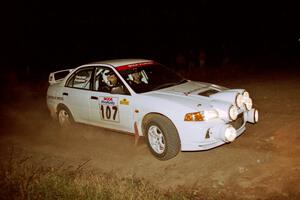 Tim Paterson / Scott Ferguson Mitsubishi Lancer Evo IV at the spectator corner on SS4, Far Point I.