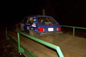 Mark Utecht / Brenda Corneliusen Dodge Omni GLH Turbo at speed across the final bridge on SS10, Menge Creek.