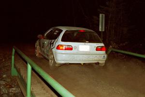 Tom Lawless / Brendan Lawless Honda Civic at speed across the final bridge on SS10, Menge Creek.