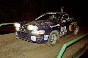 Patrick Lilly / Mark McAllister Subaru WRX at speed across the final bridge on SS10, Menge Creek.