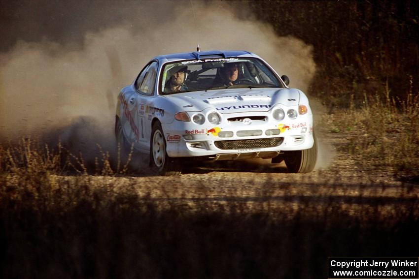 Paul Choiniere / Jeff Becker Hyundai Tiburon at speed on the practice stage.