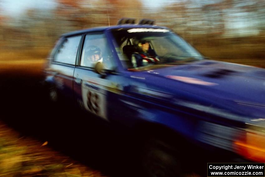 Mark Utecht / Brenda Corneliusen Dodge Omni GLH Turbo at speed on the practice stage.