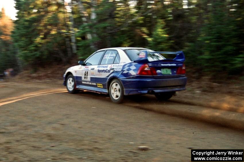 Karl Scheible / Russ Hughes Mitsubishi Lancer Evo V at speed near the finish of SS1, Herman.