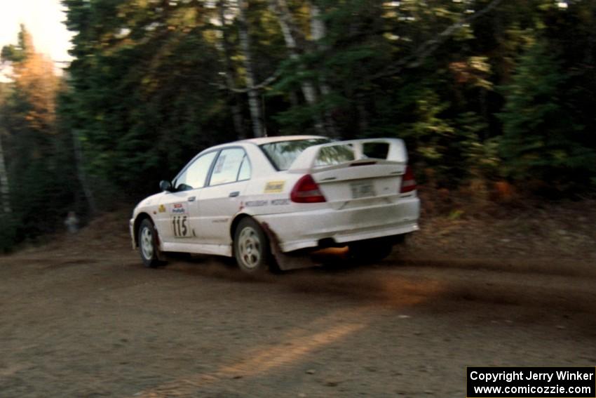 Seamus Burke / Frank Cunningham Mitsubishi Lancer Evo IV at speed near the finish of SS1, Herman.