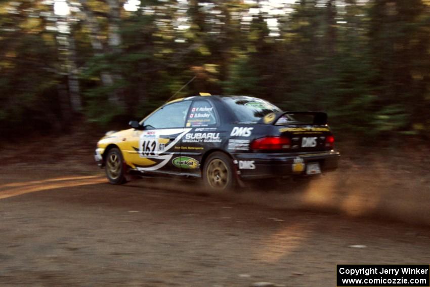 Pat Richard / Ben Bradley Subaru Impreza 2.5RS at speed near the finish of SS1, Herman.