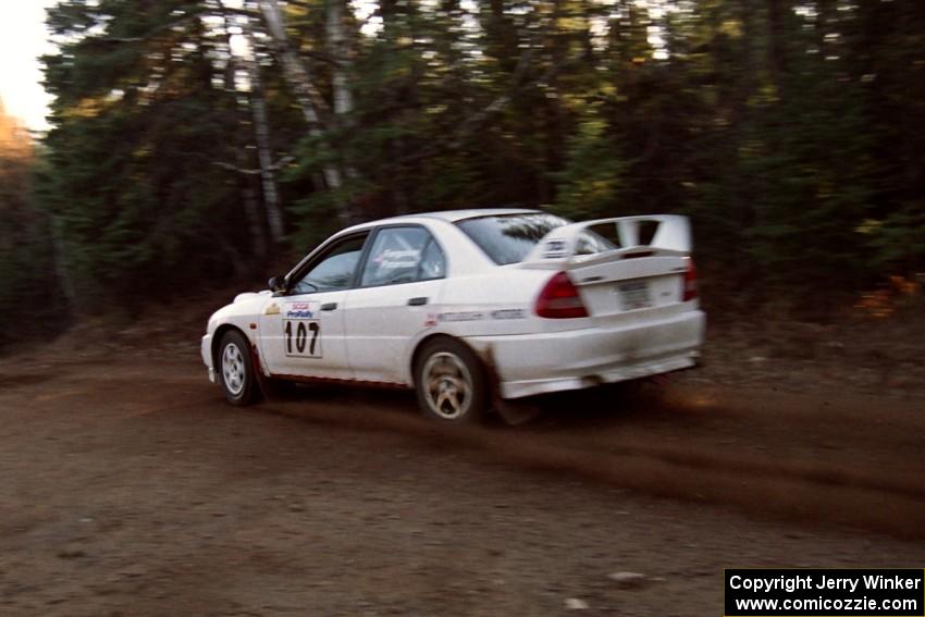 Tim Paterson / Scott Ferguson Mitsubishi Lancer Evo IV at speed near the finish of SS1, Herman.