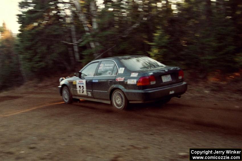 Nick Robinson / Carl Lindquist Honda Civic at speed near the finish of SS1, Herman.