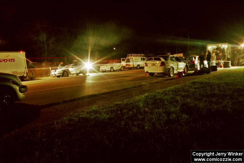 Libra Racing's Hyundai Tiburons on one side of the road with Vermont Sports Car's Mitsubishi Lancer Evos on the other.