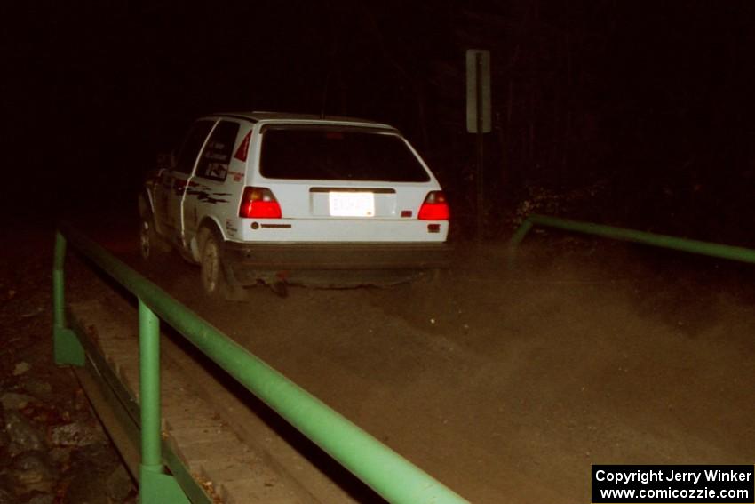 Bob Nielsen / Brett Corneliusen VW GTI at speed across the final bridge on SS10, Menge Creek.