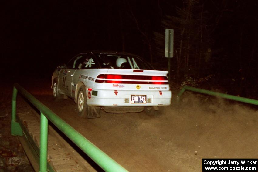 Chris Czyzio / Eric Carlson Mitsubishi Eclipse GSX at speed across the final bridge on SS10, Menge Creek.