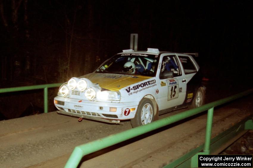 Brad Hawkins / Adrian Wintle VW GTI at speed across the final bridge on SS10, Menge Creek.