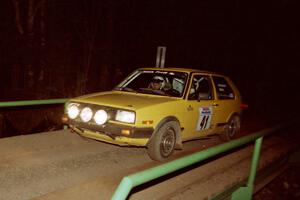 Art Burmeister / Bob Martin VW GTI at speed across the final bridge on SS10, Menge Creek.