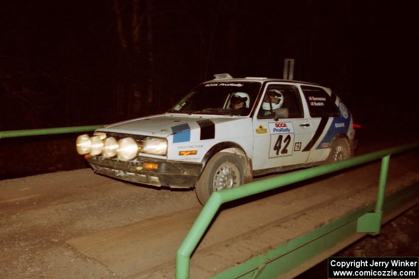 Eric Burmeister / Mark Buskirk VW GTI at speed across the final bridge on SS10, Menge Creek.