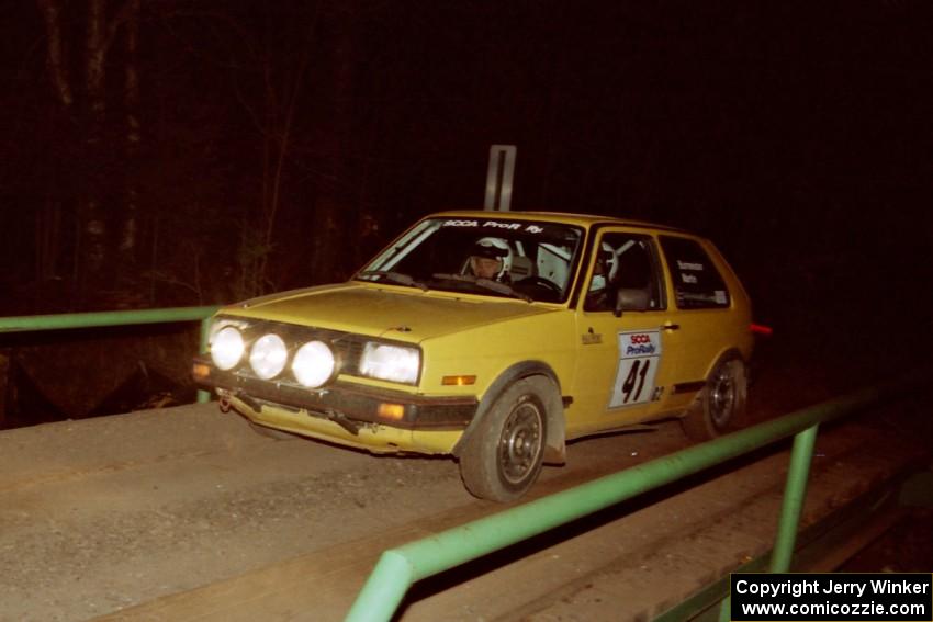 Art Burmeister / Bob Martin VW GTI at speed across the final bridge on SS10, Menge Creek.