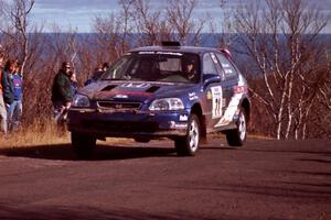 Bryan Hourt / Mike Dunn Honda Civic at the final yump on SS13, Brockway Mountain.