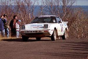 Steve Nowicki / David Stone Mazda RX-7 at the final yump on SS13, Brockway Mountain.