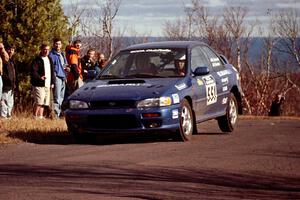 Mark Sarnecki / Rick Hansen Subaru Impreza 2.5RS at the final yump on SS13, Brockway Mountain.