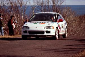 Tom Lawless / Brendan Lawless Honda Civic at the final yump on SS13, Brockway Mountain.