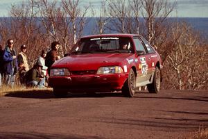 Jeremy Butts / Jon Vrzal Ford Mustang GT at the final yump on SS13, Brockway Mountain.