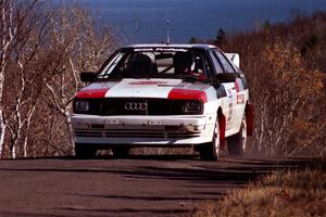 Jim Warren / Chuck Binder Audi Quattro Coupe at the final yump on SS13, Brockway Mountain.