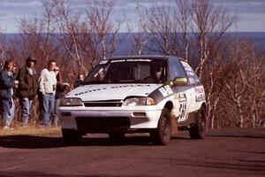 Pete Beaupre / Tim Ballon Suzuki Swift at the final yump on SS13, Brockway Mountain.