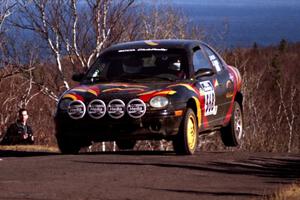 Phil Macy / John O'Neill Plymouth Neon ACR at the final yump on SS13, Brockway Mountain.